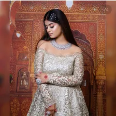 See how my collection goes beyond the wedding day. This gorgeous off-shoulder gown paired with a sparkling diamond necklace is perfect for your reception, cocktail party, or engagement. It’s all about modern glamour.