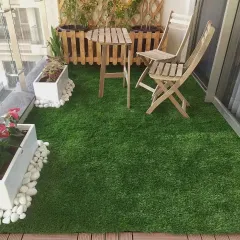 An identical image showing the functional and attractive combination of artificial turf and WPC tiles, creating distinct zones for planting and seating on a compact balcony.