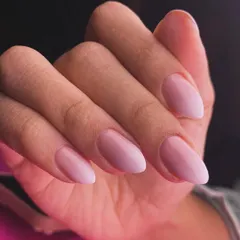A clean and simple milky pink ombré, offering a "your nails but better" look that is effortlessly chic.