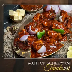 A fusion of flavours you must try: Mutton Schezwan Tandoori. I take tender tandoori mutton pieces and toss them in a bold, spicy Schezwan gravy with chunks of onion and capsicum. It’s the perfect blend of Indian smokiness and Chinese spice.
