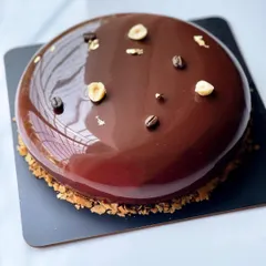 A top-down view of the stunning Coffee Hazelnut entremet.