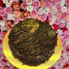 For the ultimate indulgence, try my exclusive Brownie Cake. It combines the fudgy texture of a brownie with the structure of a cake, all covered in rich chocolate piping and shavings. It's a truly decadent treat.