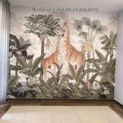 This is a custom jungle mural for a child's room, featuring two large giraffes and other animals. I focus on perfect alignment to make sure large, detailed scenes like this look like a single piece of art.