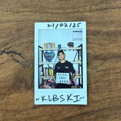 A polaroid from the studio, holding a sign for my 'Kalbaisakhi under NDCR' set. Just a snapshot of my creative space.