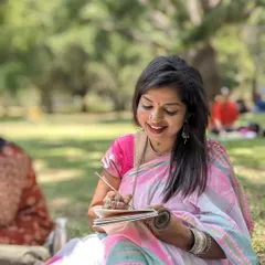 A candid moment of me smiling while painting in my sketchbook. The peaceful atmosphere of the park is the perfect backdrop for letting creativity bloom.