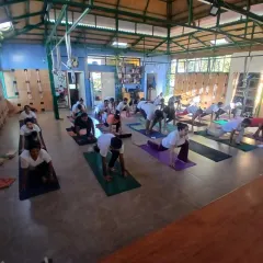 Another perspective of a busy class in our studio. The space is designed to be open and inspiring, with all the necessary props, including our signature rope wall, readily available.