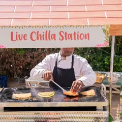 Experience the excitement of food cooked fresh for your guests with my interactive live chilla station. My chef prepares savory Indian crepes on the spot, providing both a delicious meal and an engaging culinary show.