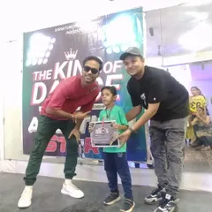 A proud moment as one of our youngest students receives his certificate at the King of Dance audition.