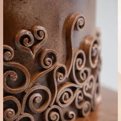 This detailed shot showcases the handcrafted chocolate scrollwork, featuring delicate heart shapes. It's these personal, artistic touches that make my chocolate creations more than just a dessert.
