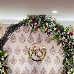 This custom-made gold acrylic monogram with the couple's initials (A & S) was the centerpiece of their engagement stage. It's a classy and modern way to celebrate your union.