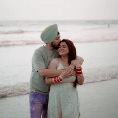 A slightly different angle of the same embrace, showing more of the couple's happy expressions. Capturing multiple shots ensures we get the perfect emotional beat.