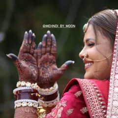 The joy on a bride's face when she sees her perfect mehndi stain. A dark stain is considered auspicious for a bride, and I make sure to provide the best quality henna for that perfect color.