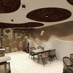 In this Haldwani cafe, I created a cozy, earthy atmosphere using natural materials and textures. The custom ceiling with woven cane inserts becomes a central design feature, complemented by terrazzo flooring and a layered wall texture to craft a unique and memorable cafe aesthetic.
