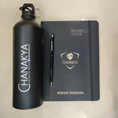 A simple yet effective corporate gift set. This combo includes a custom-logo metal bottle, a notebook, and a pen, ideal for conferences or employee appreciation.