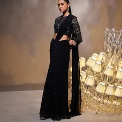 The Diana Saree Set, featuring a draped silhouette and a meticulously hand-embellished illusion long-sleeve blouse for ultimate sophistication.