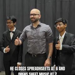 A teacher gives a thumbs up with his students. Our mentors are not just instructors; they are role models and cheerleaders for our young musicians.