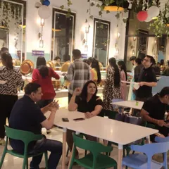 Friends and families gathered at our restaurant. The open seating and buffet line make it an ideal spot for casual get-togethers and conversations over a good meal.