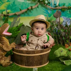 Welcome to the jungle! This little explorer is ready for an adventure in our dinosaur and jungle-themed set, perfect for a six-month milestone.