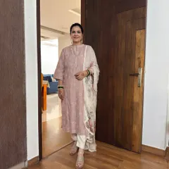 For my complete Teej look, I paired the pink kurta with white pants and a floral dupatta from another suit, showing how you can mix and match for a fresh look.