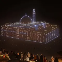 A stunning drone formation of a mosque against the night sky at the Ya Hala Festival in Kuwait. Our shows blend technology with cultural reverence, creating powerful and respectful tributes.
