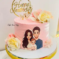 Because every love story deserves a beautiful chapter. A sweet anniversary cake with a family portrait and fresh flowers.