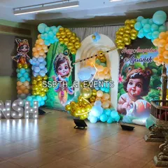 A wide view of the Little Krishna themed event space. I ensure the decoration fills the room and creates an immersive experience for guests from the moment they walk in.
