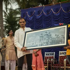 Gifting my Guruji, Sharath Jois, a framed photograph of the Mysore Palace is one of my most cherished memories. His simple encouragement to "keep taking photos and creating beautiful memories" has stayed with me. His guidance continues to be a light on my journey.