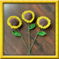 Here are three of my single-stem crochet sunflowers, each crafted with bright yellow petals and a detailed brown center. These are great for creating your own custom arrangement or as a simple, cheerful gift that won't wilt.
