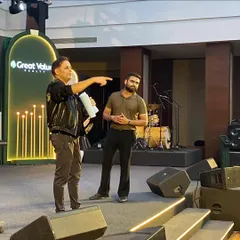Interacting with an audience member during the Great Value Realty event. My shows are all about connection, and I love bringing people on stage to experience the magic firsthand.