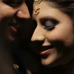 A tight, intimate close up of Deepali and Anmol. This shot focuses purely on their expressions and the emotional connection, creating a powerful and romantic portrait.