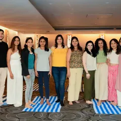 Posing with participants after a successful sound healing and wellness event at the Courtyard by Marriott.