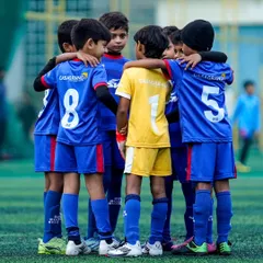 More than just a team, we are a family. This huddle before a match captures the spirit of unity and mutual support that we instill in our players from the very beginning.