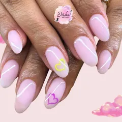 The prettiest shade of pink. A simple and clean design with a sheer pink base, white swirls, and tiny heart details.