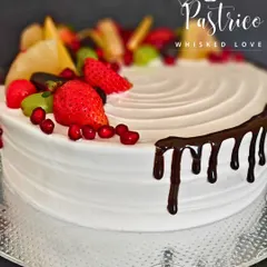 My fresh fruit cake is loaded with seasonal fruits and a light whipped cream, a refreshing and delicious choice for any occasion.