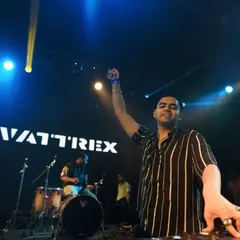 DJ Swattrex hyping up the crowd at ELIXIR 2024. I captured this moment to show the direct interaction between the performer and the energetic student audience.