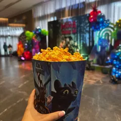 Dragon-themed popcorn boxes, a simple touch that brings the party's theme to life. It's these little details that make a big difference.