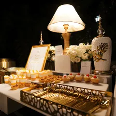 Another view of our sophisticated dessert station, showcasing the meticulous arrangement and luxurious ambiance we create for our clients' events.