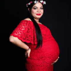 A radiant close up portrait of the mom to be. I love using simple props like a floral crown to add a soft, beautiful touch to maternity photos.