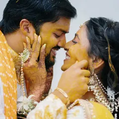 A playful and intimate moment during the Haldi. We get up close to capture the laughter and emotion, making you feel like you are part of the celebration.