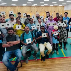 We specialize in creating memorable and effective corporate team-building events. Here, a team from Pixcellence Tech proudly displays their targets after a successful session focused on improving concentration and fostering friendly competition.