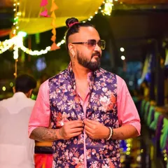 Dressed for the occasion at a Dandiya Night at Gillys 104. For traditional events, I blend classic Garba tracks with modern Bollywood beats.