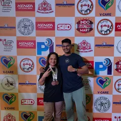 Shweta celebrating her bronze medal at her first National Masters meet. This was a huge milestone and a proud moment for both of us.