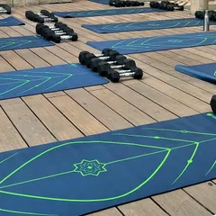 The calm before the storm. Setting up for our outdoor training event, with mats and dumbbells ready for a morning of movement and community energy.