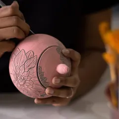 We also offer Sgraffito workshops on different forms, like this lidded jar. You get to spend three hours learning, carving, and painting, and we'll glaze and fire it for you.