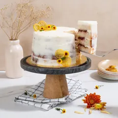 A dash of sweet with a tangy zest. My Lemon & Berry Cake has moist lemon and vanilla cake layers, a homemade berry compote filling, and a light cream cheese frosting.
