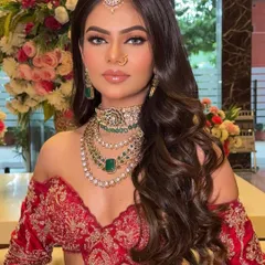 A glimpse of the final result: a royal bridal glam look. We focus on creating that flawless, radiant base, sharp kohl-rimmed eyes, and the perfect nude lip that so many modern brides ask for.
