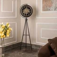 This stunning standing clock in black and gold combines utility and style perfectly. The moving gear mechanism makes it an uber-stylish accent piece that can elevate any corner of your home.
