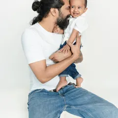 The special bond between a father and his son, full of smiles and cuddles. These are the memories that last a lifetime.