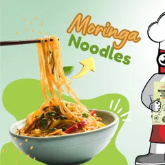 A delicious bowl of our Moringa Noodles, held by our mascot. These noodles are steamed, not fried, and packed with the power of moringa leaves for a truly healthy meal.