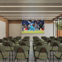 The mini-theater and multipurpose hall at Sanctum apartments. We design community amenities that extend living spaces and foster interaction among residents.